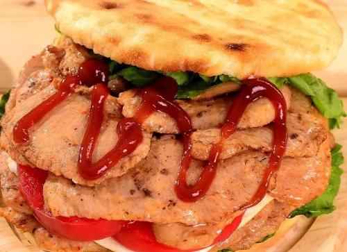 路邊攤的餅夾里脊肉咋做？